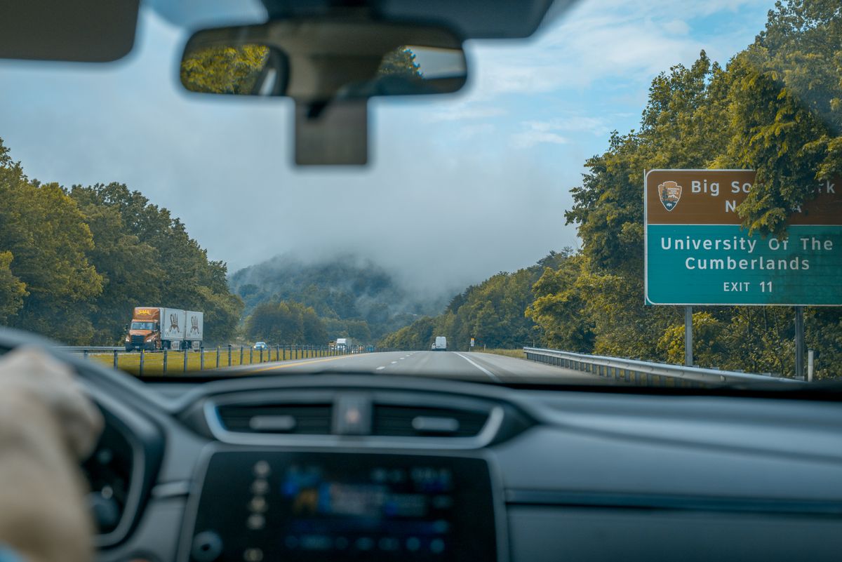 A highway through misty mountains