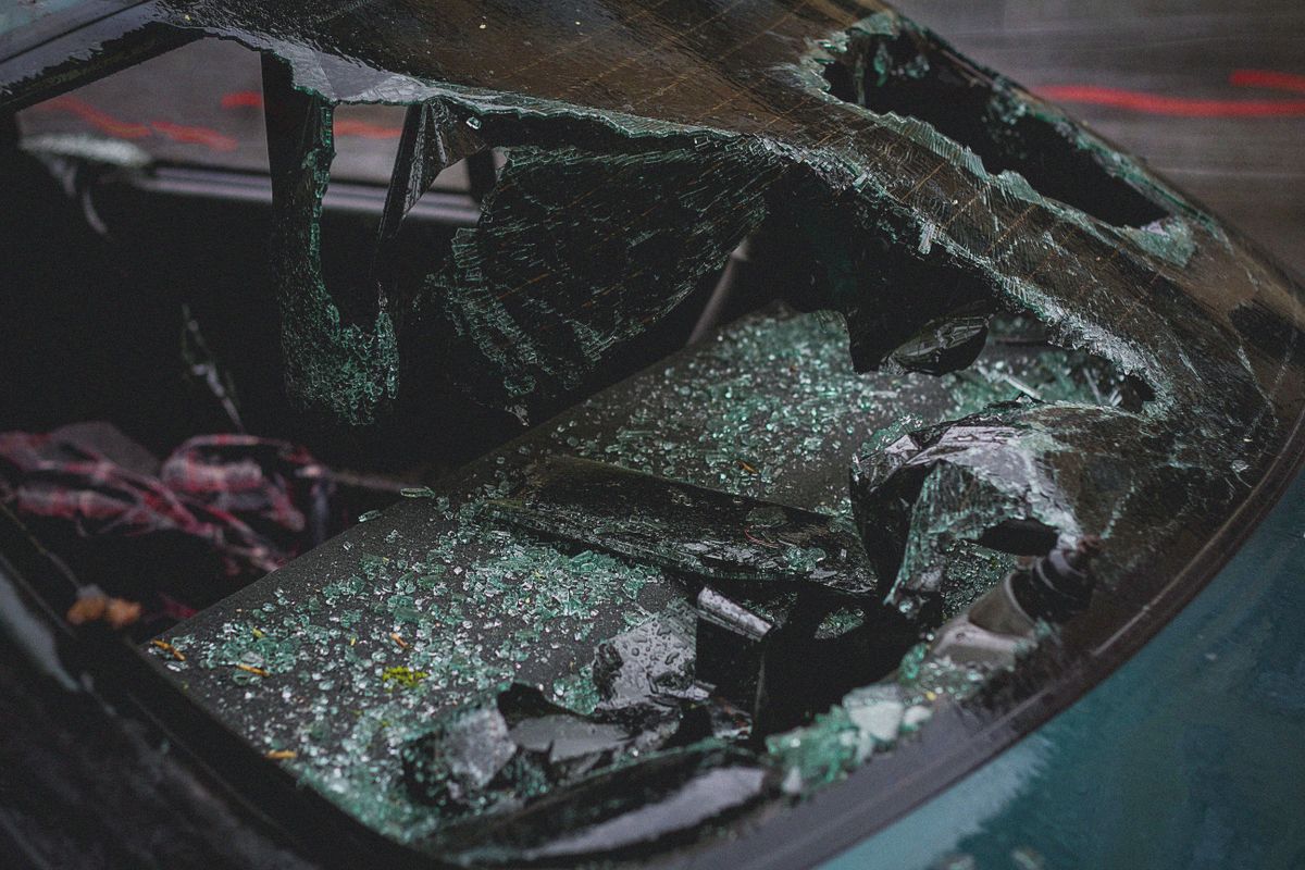Detailed view of shattered car windshield after accident